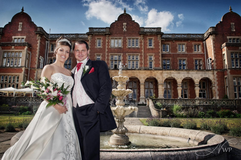 Berkshire wedding venue with couple by fountain