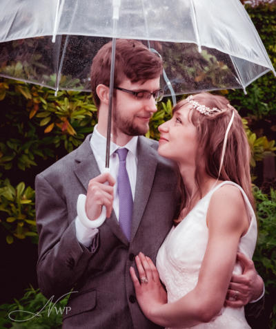 Wedding photography in the rain at the Watermill Theatre