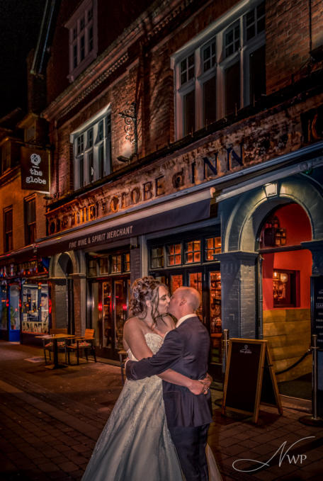 Newbury Wedding Photographer takes dramatic couple photo by Town Centre Globe Pub
